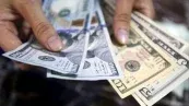 Dólar cai no início da sessão enquanto mercado digere derrota do governo no Congresso